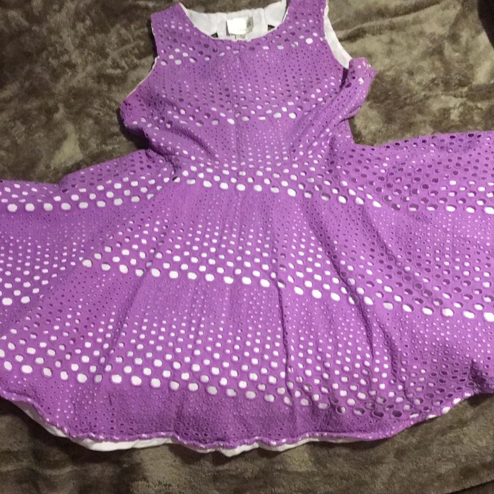 Purple, open back dress.